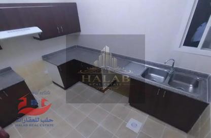 شقة - 2 غرف نوم - 2 حمامات للايجار في مركز الأعمال غانم - فريج بن محمود- جنوب - فريج بن محمود - الدوحة