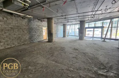 محل تجاري - استوديو - 1 حمام للايجار في بناية ايفيرجرين التجارية - مدينة الطاقة - الوسيل