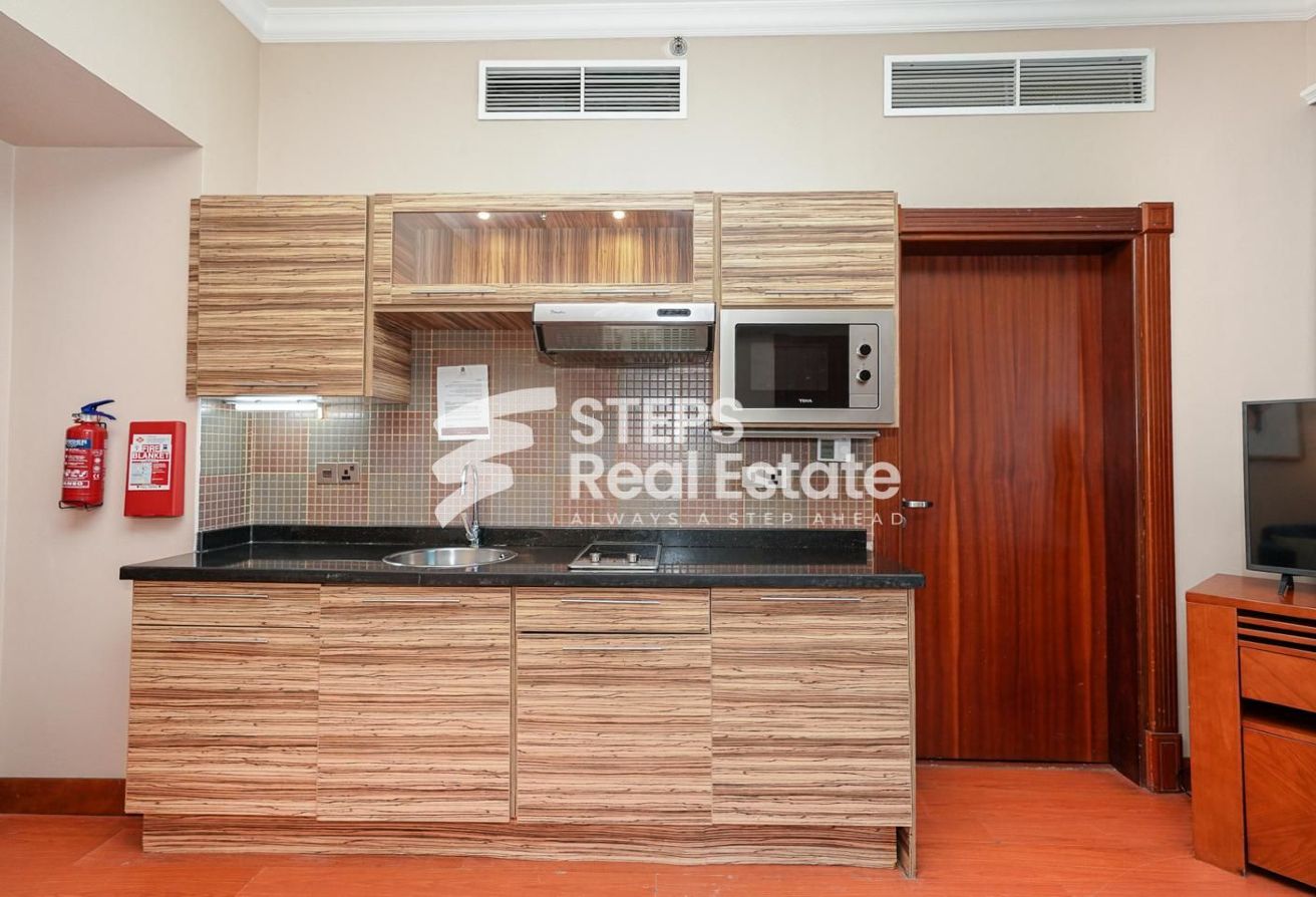 Furnished 1-Bedroom Flat for Rent in West Bay - apartment in Al Shatt Street