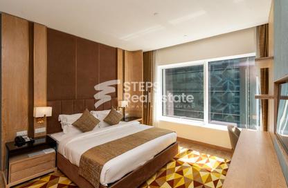 Apartment - 2 Bedrooms - 3 Bathrooms for rent in The Bentley Luxury Hotel  and  Suites - West Bay - Doha