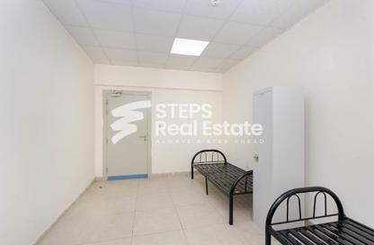 Labor Camp - Studio - 2 Bathrooms for rent in Industrial Area 4 - Industrial Area - Industrial Area - Doha