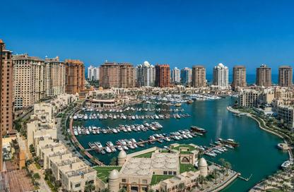 Apartment - 2 Bedrooms - 3 Bathrooms for sale in East Porto Drive - Porto Arabia - The Pearl Island - Doha Apartment - 2 Bedrooms - 3 Bathrooms for sale in East Porto Drive - Porto Arabia - The Pearl Island - Doha