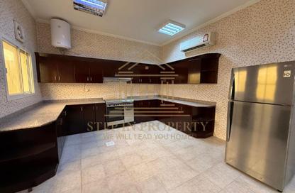 Villa - 4 Bedrooms - 5 Bathrooms for rent in Bu Hamour Street - Abu Hamour - Doha