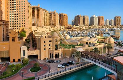 Apartment - 3 Bedrooms - 4 Bathrooms for sale in Tower 10 - Porto Arabia - The Pearl Island - Doha