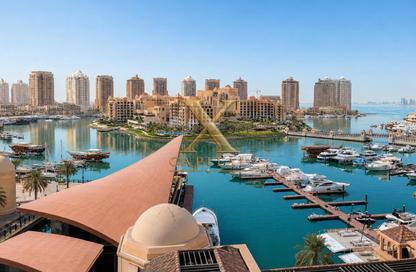 Apartment - 3 Bedrooms - 4 Bathrooms for sale in Tower 10 - Porto Arabia - The Pearl Island - Doha