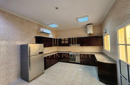 Villa - 4 Bedrooms - 5 Bathrooms for rent in Bu Hamour Street - Abu Hamour - Doha