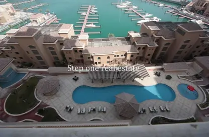 Apartment - 2 Bedrooms - 3 Bathrooms for sale in Porto Arabia Townhouses - Porto Arabia - The Pearl Island - Doha