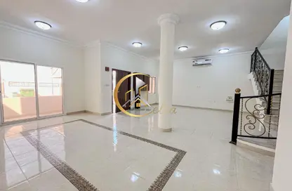 Villa - 5 Bedrooms - 4 Bathrooms for rent in Wadi Al Shaheeniya Street - Ain Khaled - Doha