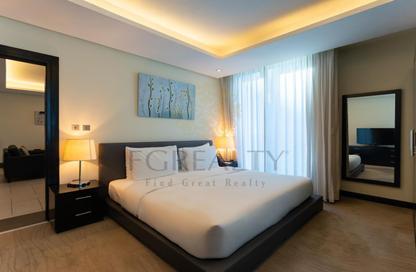 Apartment - 1 Bedroom - 2 Bathrooms for rent in West Bay Tower - West Bay - West Bay - Doha