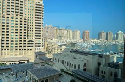 Apartment - 2 Bedrooms - 3 Bathrooms for sale in West Porto Drive - Porto Arabia - The Pearl Island - Doha