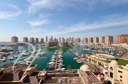 Apartment - 2 Bedrooms - 3 Bathrooms for rent in Tower 24 - Porto Arabia - The Pearl Island - Doha
