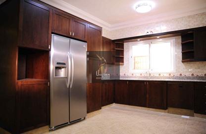 Compound - 4 Bedrooms - 5 Bathrooms for rent in Abu Sidra - Al Rayyan - Doha
