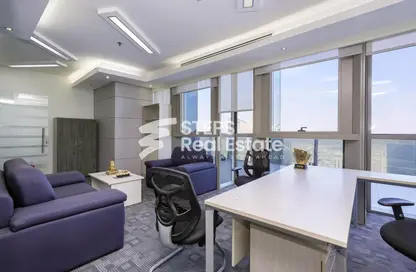 Office Space - Studio - 2 Bathrooms for sale in Palm Tower A - Palm Towers - West Bay - Doha