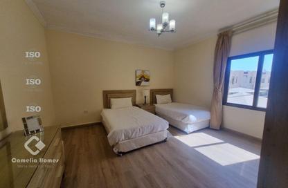 Compound - 4 Bedrooms - 5 Bathrooms for rent in Umm Al Seneem Street - Ain Khaled - Doha