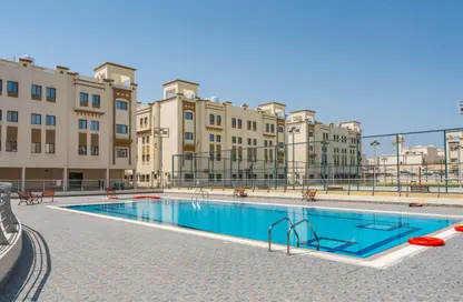 Apartment - 2 Bedrooms - 2 Bathrooms for rent in Ezdan Village 2 - Al Duhail - Doha