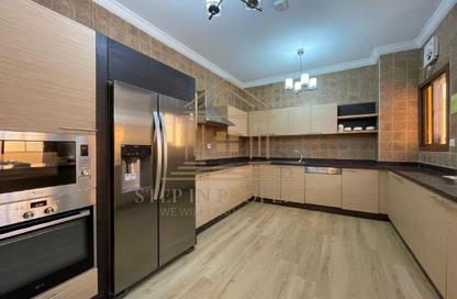 Villa - 4 Bedrooms - 5 Bathrooms for rent in Umm Al Seneem Street - Ain Khaled - Doha