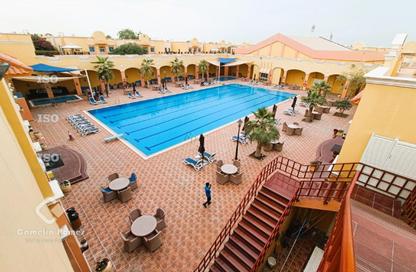 Compound - 4 Bedrooms - 5 Bathrooms for rent in Abu Sidra - Al Rayyan - Doha