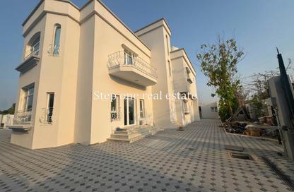 Villa - 5 Bedrooms - 7 Bathrooms for rent in Onaiza Street - Diplomatic Area - Doha