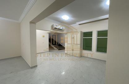 Villa - 4 Bedrooms - 5 Bathrooms for rent in Al Hanaa Street - Al Gharrafa - Doha