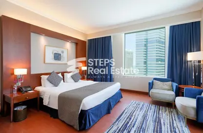 Apartment - 1 Bedroom - 1 Bathroom for rent in Retaj Al Rayyan Hotel - Diplomatic Street - West Bay - Doha