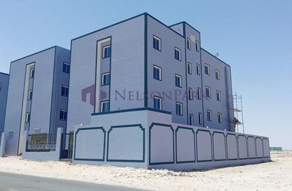 سكن عمال - استوديو - 8 حمامات للايجار في شارع الصناعية الشرقي - بركة العوامر - الوكرة