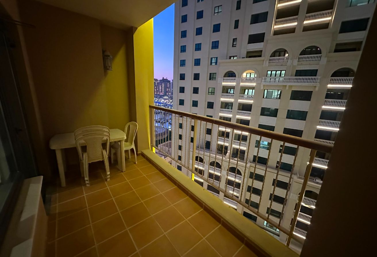 Porto Arabia:Furnished 1BR + Office Space QAR 8500 thumbnail 8