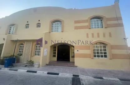 Compound - 6 Bedrooms - 4 Bathrooms for rent in Umm Al Seneem Street - Ain Khaled - Doha