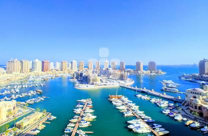 Apartment - 2 Bedrooms - 3 Bathrooms for sale in Tower 9 - Porto Arabia - The Pearl Island - Doha