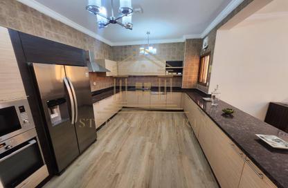 Villa - 4 Bedrooms - 5 Bathrooms for rent in Bu Hamour Street - Abu Hamour - Doha