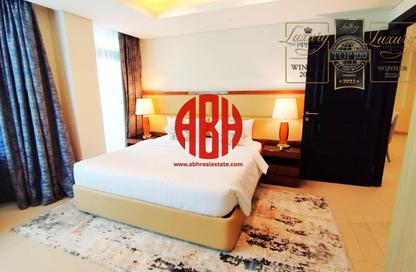 Apartment - 2 Bedrooms - 4 Bathrooms for rent in Abraj Bay - Abraj Quartiers - The Pearl Island - Doha