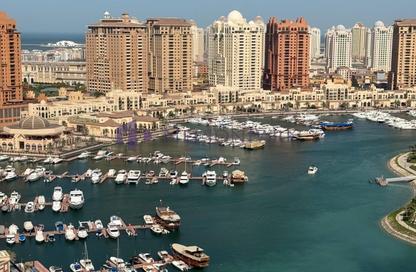 Apartment - 4 Bedrooms - 6 Bathrooms for sale in East Porto Drive - Porto Arabia - The Pearl Island - Doha Apartment - 4 Bedrooms - 6 Bathrooms for sale in East Porto Drive - Porto Arabia - The Pearl Island - Doha